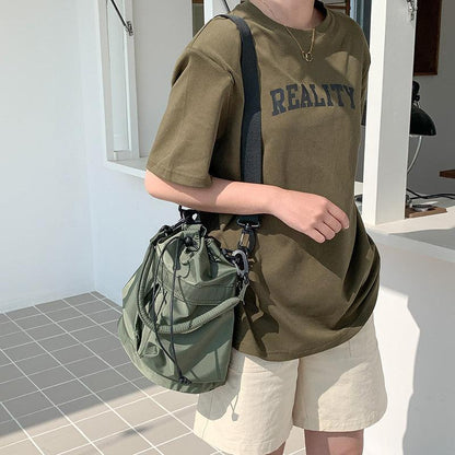 Sophia - Skulderveske med stor kapasitet og flere lommer med løpesnor