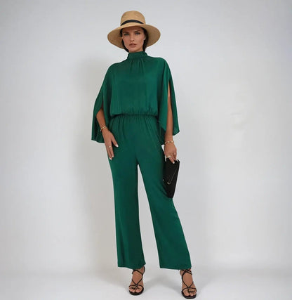 Stella - Jumpsuit med ermer i Cape-stil med åpen ryggdesign