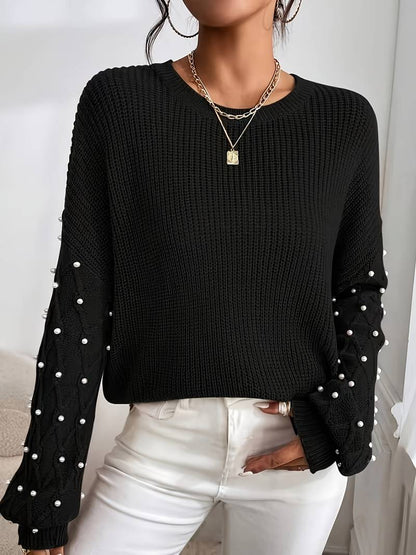 Emilia - Elegant langermet genser med rund hals og perler detaljer