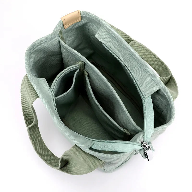 Brenda - Elegant crossbody-veske i lerret med glidelåslukking