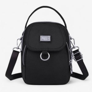Amalia – Crossbody veske med justerbar stropp og hank