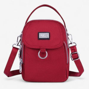 Amalia – Crossbody veske med justerbar stropp og hank
