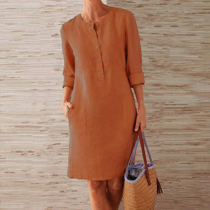 Ingrid - En A-formet kjole med rund hals og lommer