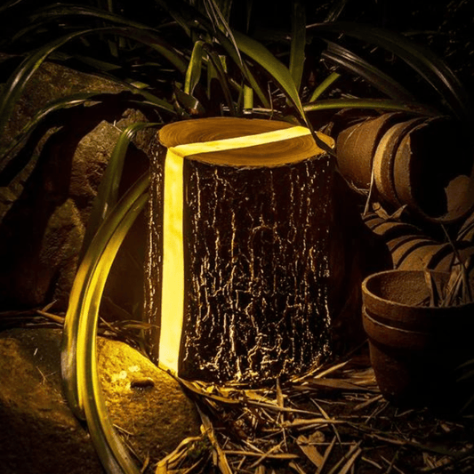 GlowLog - LED-stubblampe i tre for rolig belysning i hagen