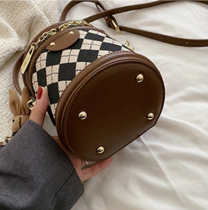 Charlotte - Rundformet håndveske med avtakbar stropp og kanin sjarm