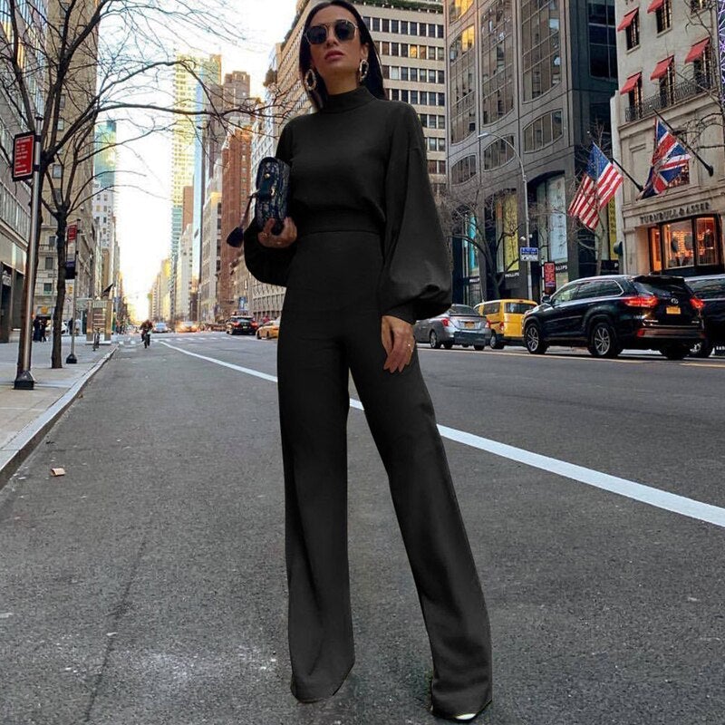Fiona - Moderne jumpsuit med ballongermer og bukser med vide ben