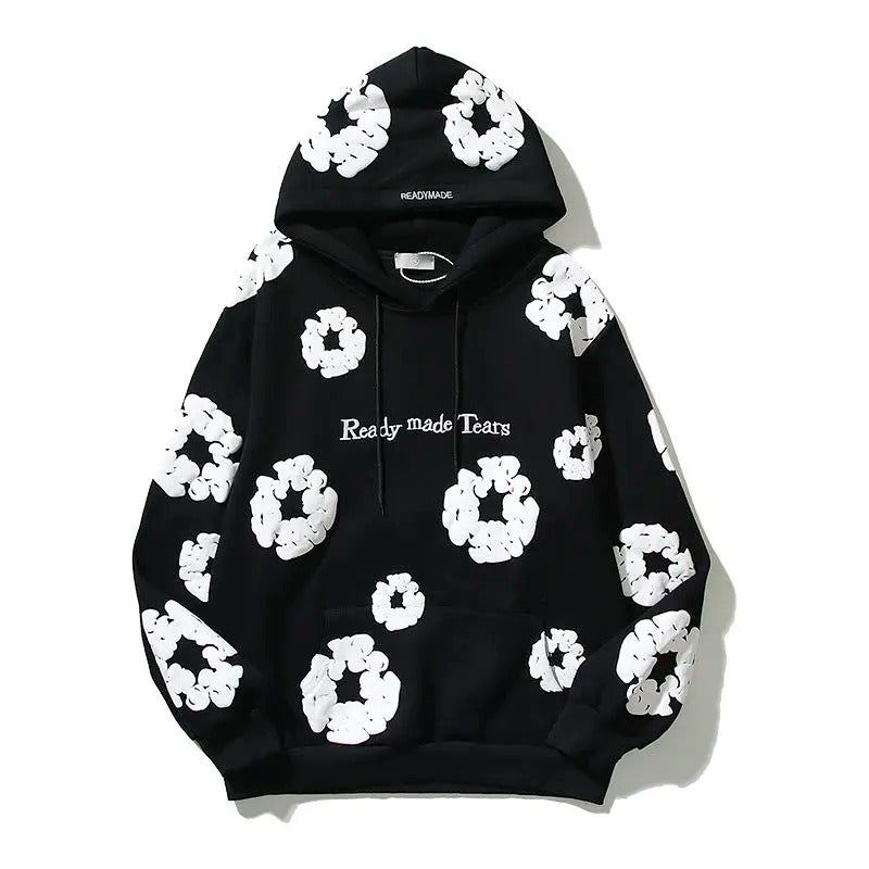 Amelia - "READY MADE TEARS" hettegenser med dristig blomsterdesign