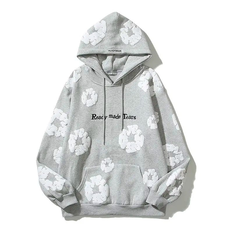 Amelia - "READY MADE TEARS" hettegenser med dristig blomsterdesign