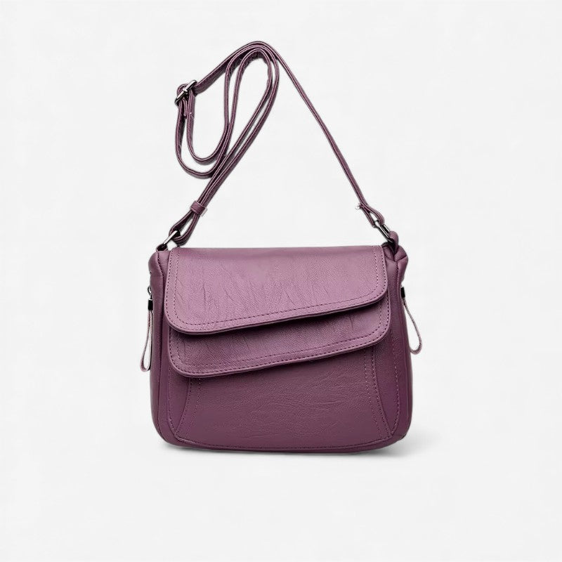 Elin – Skulderveske med justerbare stropper og glidelåslommer