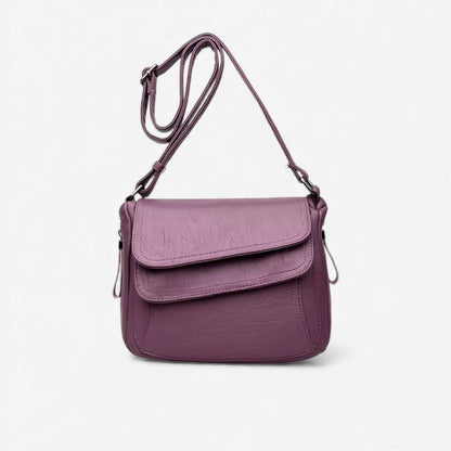 Elin – Skulderveske med justerbare stropper og glidelåslommer