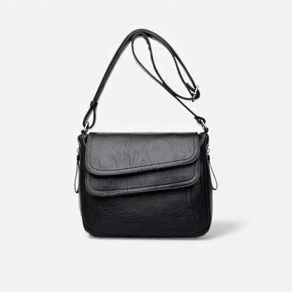 Elin – Skulderveske med justerbare stropper og glidelåslommer