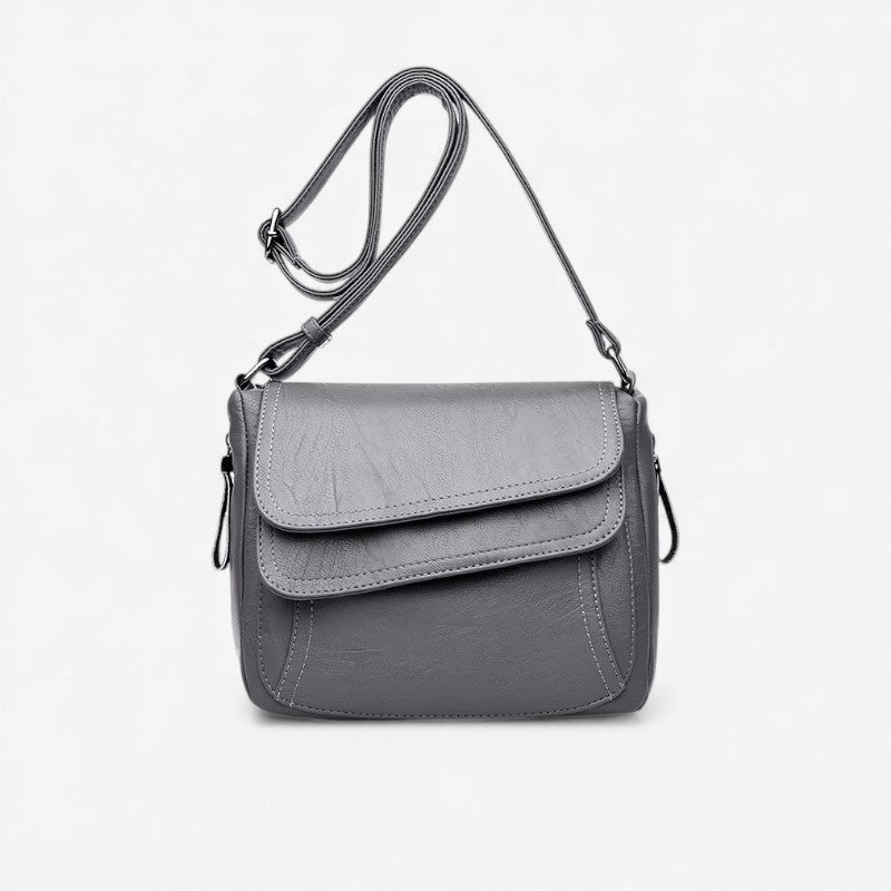 Elin – Skulderveske med justerbare stropper og glidelåslommer