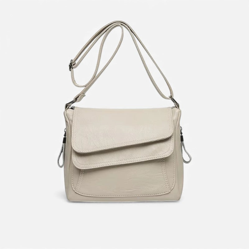 Elin – Skulderveske med justerbare stropper og glidelåslommer