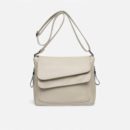 Elin – Skulderveske med justerbare stropper og glidelåslommer