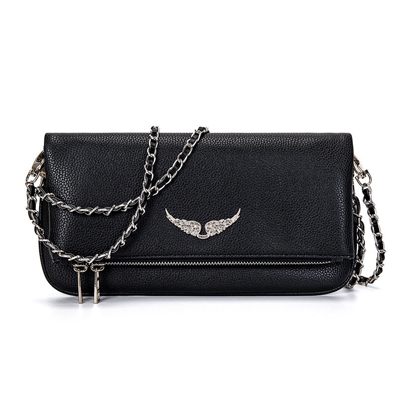 Ravenna - Trendy og slitesterk clutch med slank silhuett